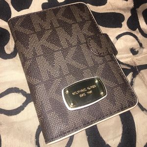 Original MK Passport Wallet. Never used.